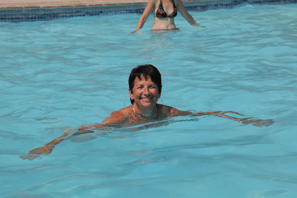 Gina Mom at swimmingpool at Halalicamp Etosha