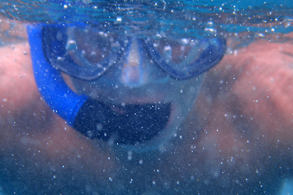 Hans Erik Mom snorkeling at Pointe aux Piments in Mauritius